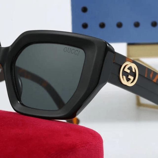 Lunette GG monture avec logo doré,  verres dégradés 
