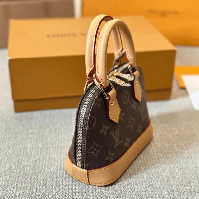 Sac LS VN à main  imprimé monogramme Alma pour femme marron 20x14cm