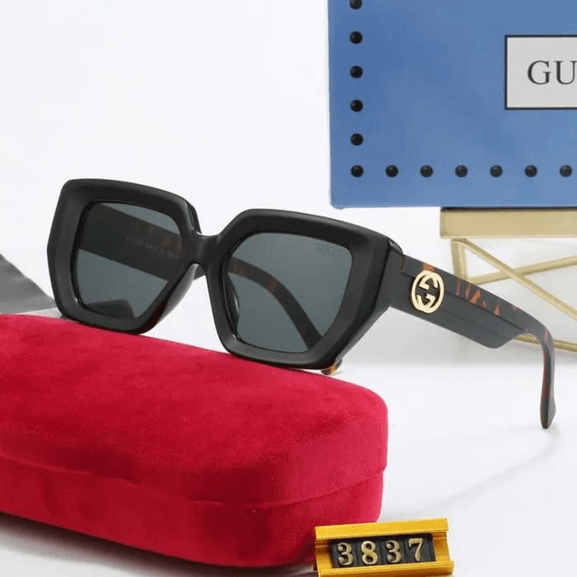Lunette GG monture avec logo doré,  verres dégradés 