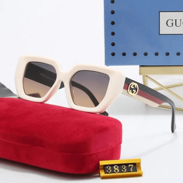 Lunette GG monture avec logo doré,  verres dégradés 