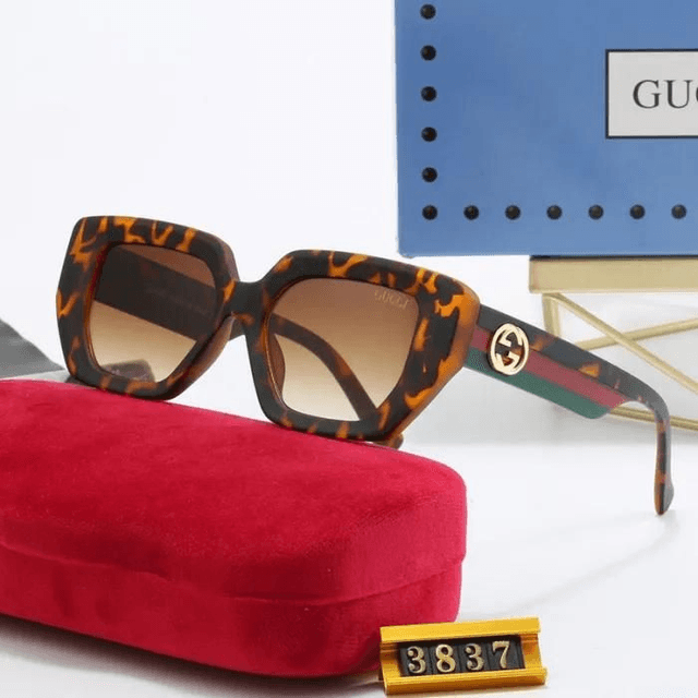 Lunette GG monture avec logo doré,  verres dégradés 