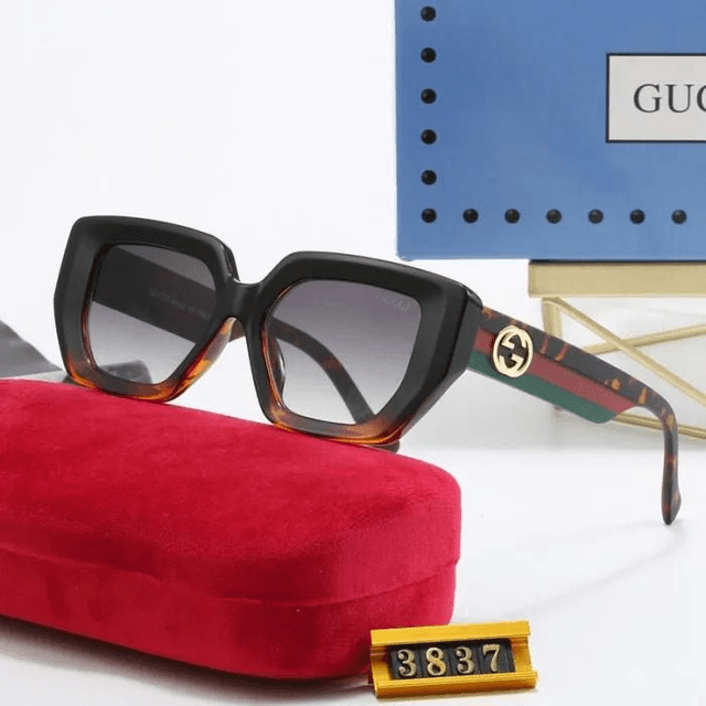 Lunette GG monture avec logo doré,  verres dégradés 