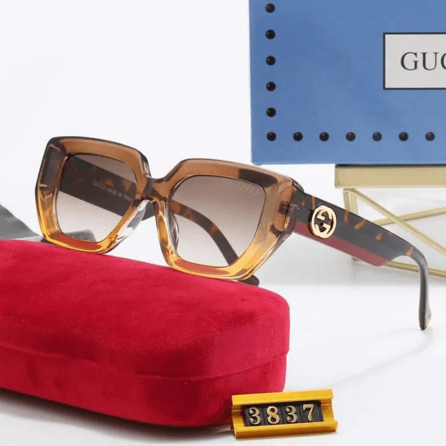 Lunette GG monture avec logo doré,  verres dégradés 