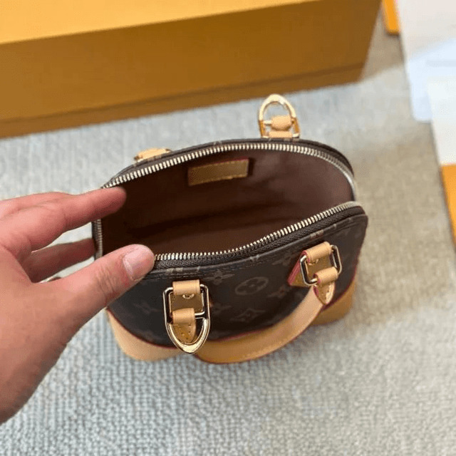 Sac LS VN à main  imprimé monogramme Alma pour femme marron 20x14cm