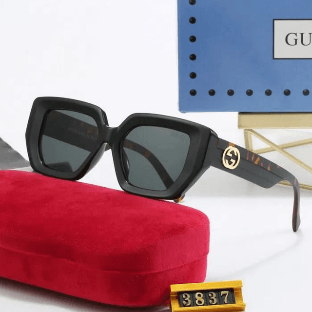 Lunette GG monture avec logo doré,  verres dégradés 